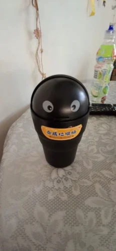 Cartoon Eyes Swing Lid Mini Trash Bin for Car photo review