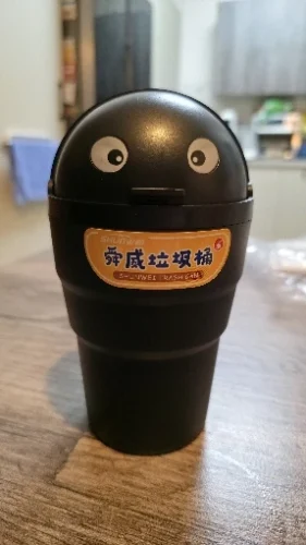 Cartoon Eyes Swing Lid Mini Trash Bin for Car photo review